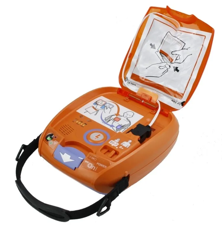 Orangener und offener Defibrillator.